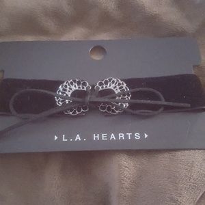 Black velvet choker with silver claps